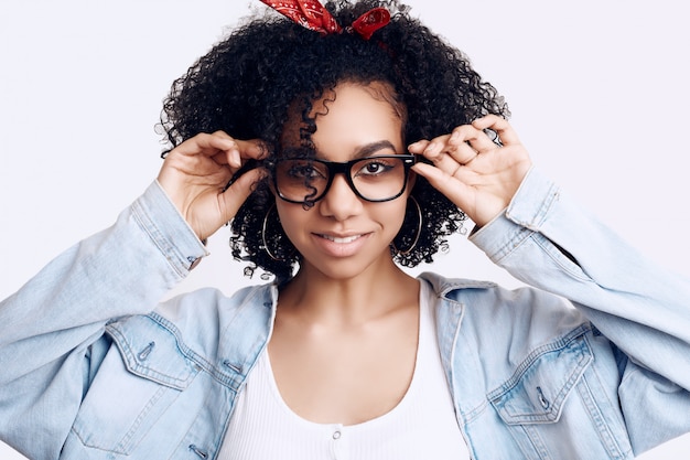 Glamor elegant black hippie teenage girl model with curly hair