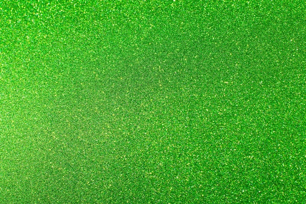 Гламурный зеленый сверкающий фон Размытый фон с блестками Праздничная абстрактная текстура Фон синих огней