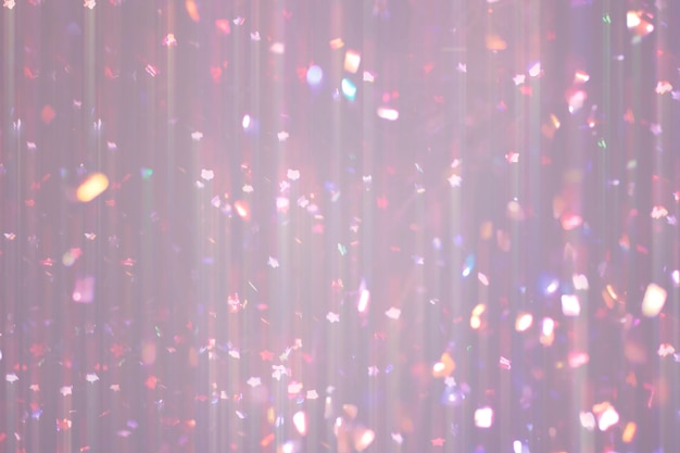 Glamorous faded pink background with flying confetti sparkles