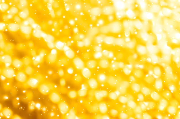 Glamorous gold shiny glow and glitter luxury holiday background