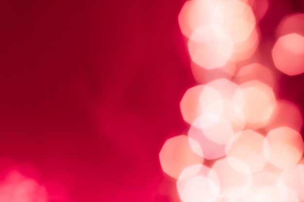 ピンクの抽象的な背景に華やかな白い光沢のあるキラキラ クリスマス正月とバレンタインデー背景ボケ オーバーレイ高級休日ブランド デザイン