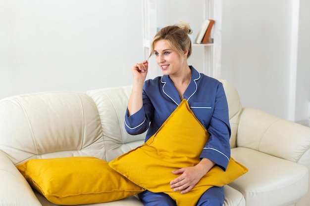 Glamorous woman wears pajama with happy smile chilling in good morning copy space positive female mo