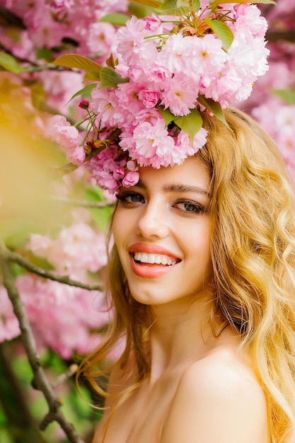 Glamour girl in pink blossom