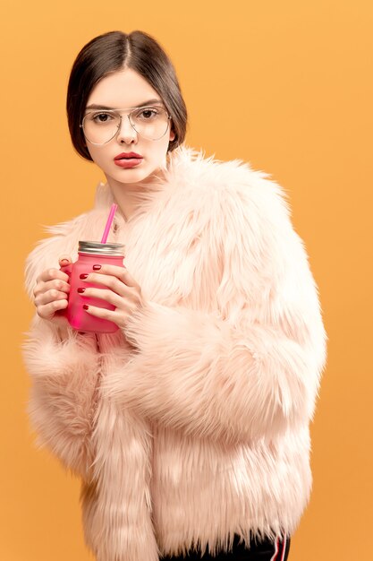 Glamour woman with drinking jar