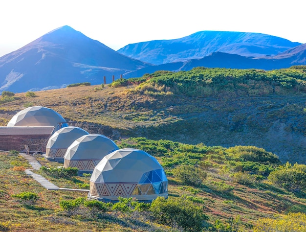 Glamping on the slope of a volcano in autumn on the kamchatka peninsula