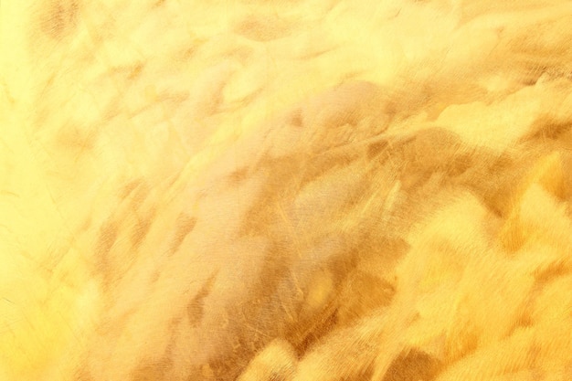 Glanzende gele bladgoud folie textuur achtergrond