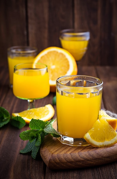 Glases of orange juice with mint