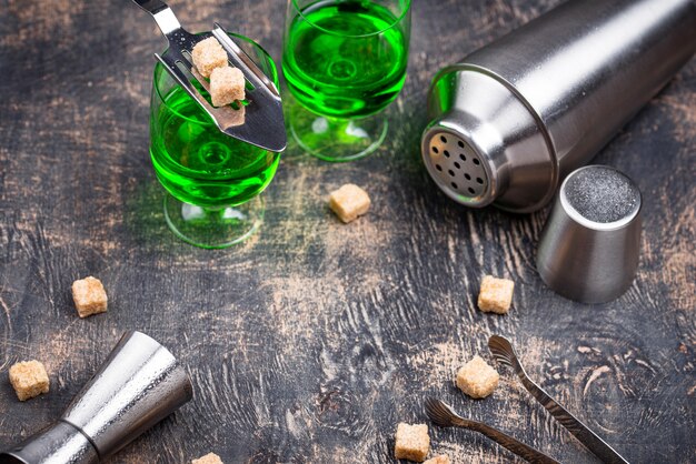 Glass of absinthe with cane sugar