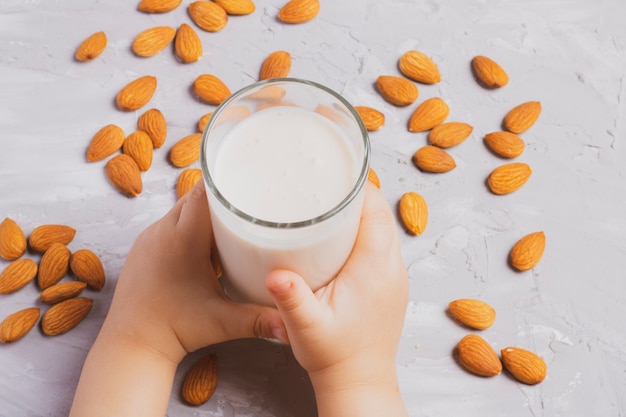 Glass of almond milk on table