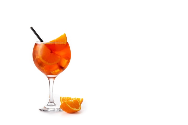 Glass of aperol spritz cocktail isolated on white background