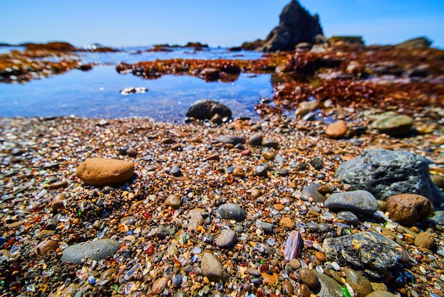 Glass Beach in California covered in colorful and shiny glass pieces