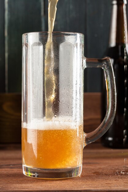 Glass of beer and beer bottle