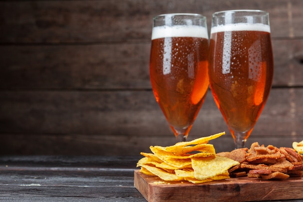 Glass beer and snacks