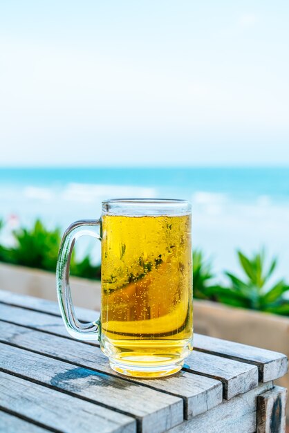 a glass of beer on a terrace