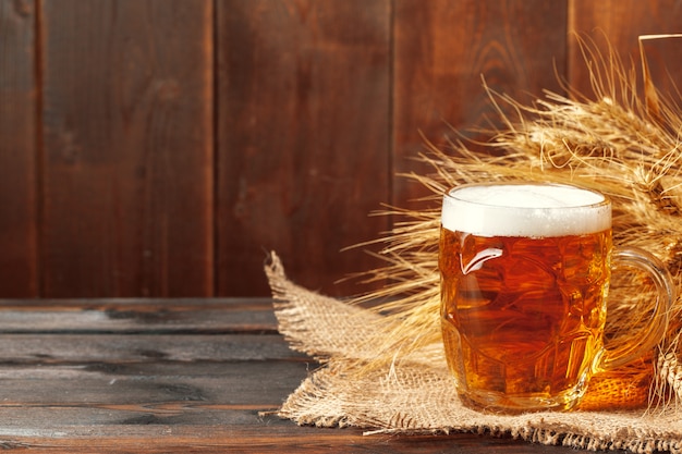 Glass beer on wood 