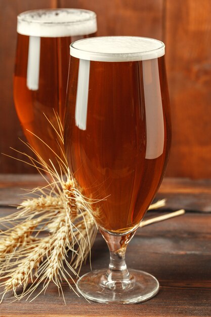 Glass beer on wooden table