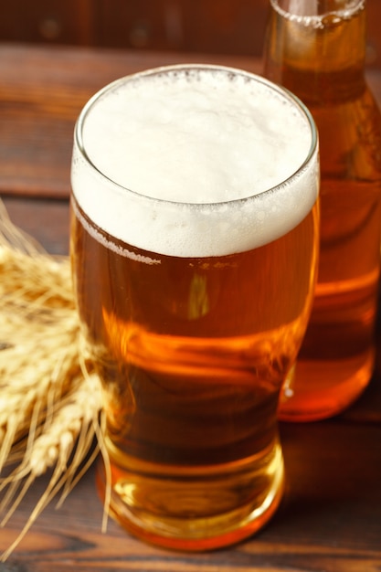 Glass beer on wooden table