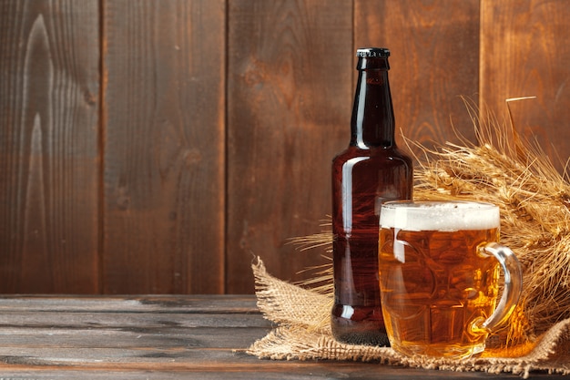 Glass beer on wooden table