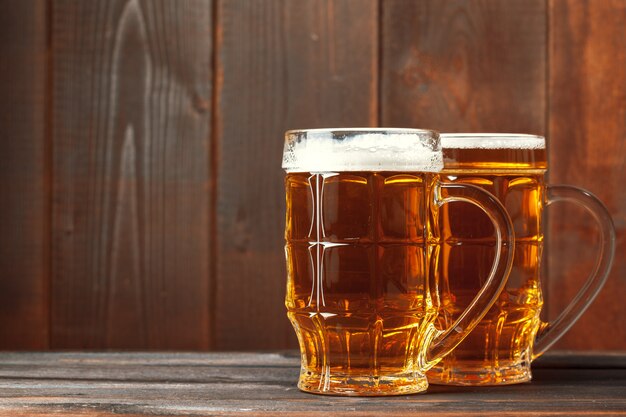 Glass beer on wooden table