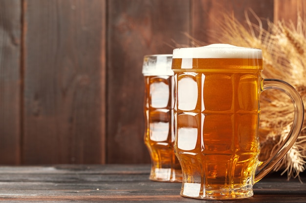 Glass beer on wooden table