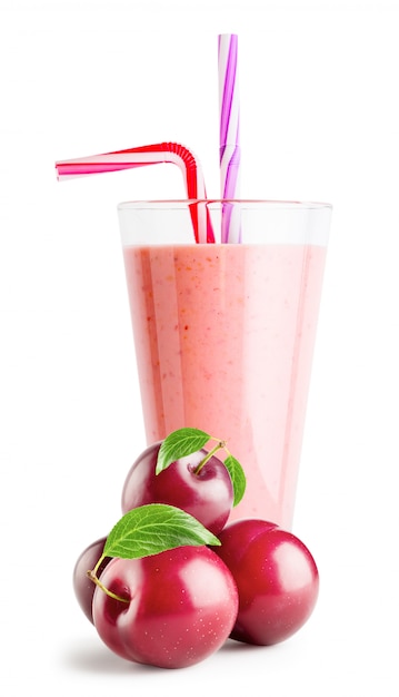 Glass of berry smoothie or yogurt with plums