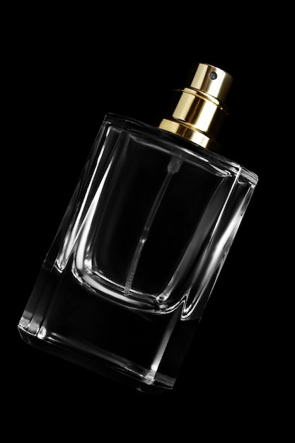 Photo glass blank perfume bottle isolated on black background