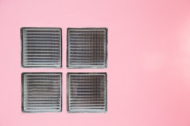 glass block on pink wall