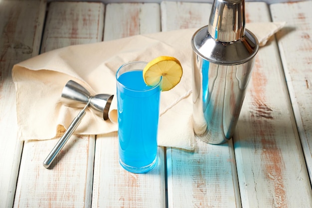 Glass of blue lagoon cocktail