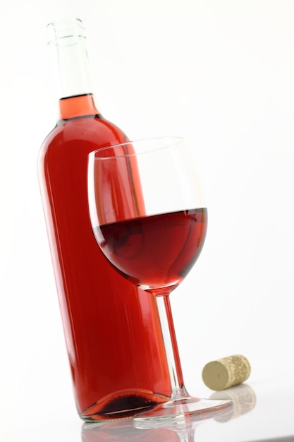 Glass and bottle of rose wine