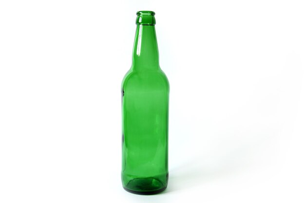 Glass bottle on a white background. Empty bottle. Green bottle on a clean background