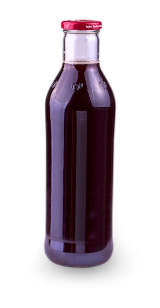 Glass bottle with a lid with pomegranate juice on white