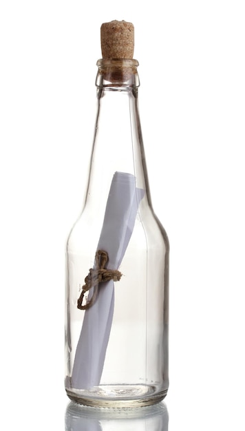 Glass bottle with note inside isolated on white