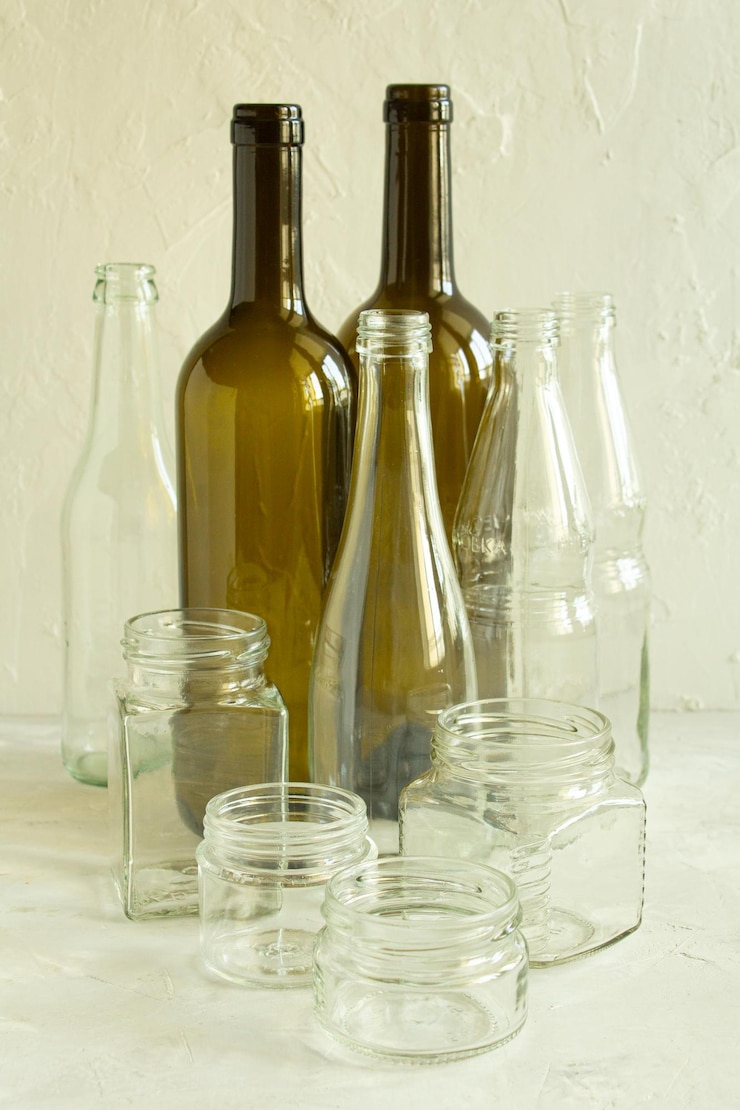 Photo glass bottles and jars washed and clean are ready to be recycled garbage glass for recycling
