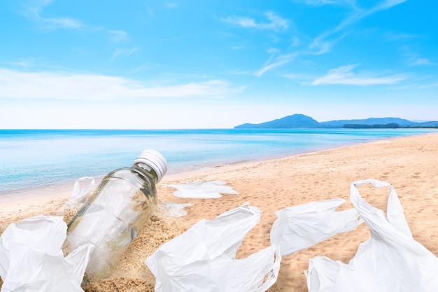 Glass bottles and plastic bags on the beach, the concept of reducing plastic bags