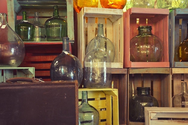 Photo glass bottles on shelves