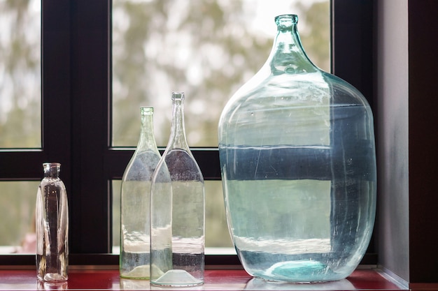 Photo glass bottles of various shapes and sizes.