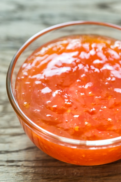 Glass bowl of thai sweet chili sauce