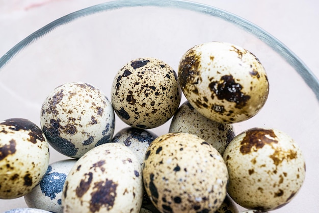 A glass bowl with quail eggs