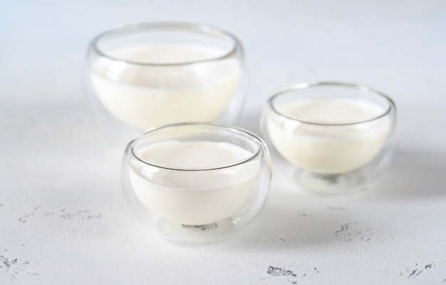 Glass bowls of dairy products