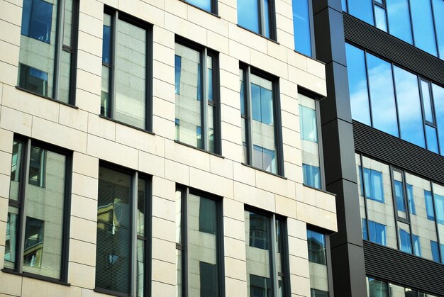 Glass building with transparent facade of the building and blue sky