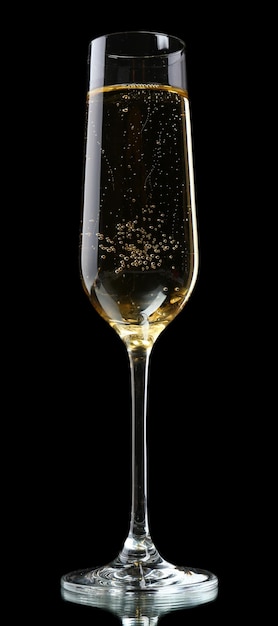 glass of champagne on black background