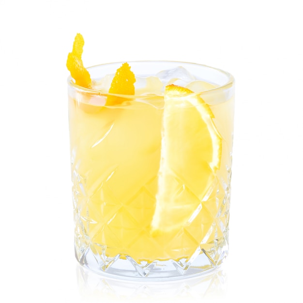 Glass of cocktail with reflection isolated on white 