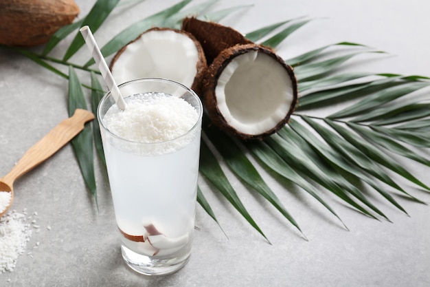 Glass of coconut water on table