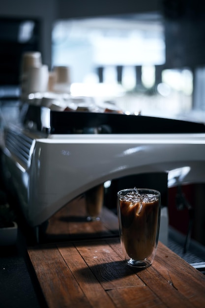 Glass of coffee with milk on the table