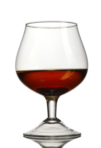 Glass of cognac isolated on white