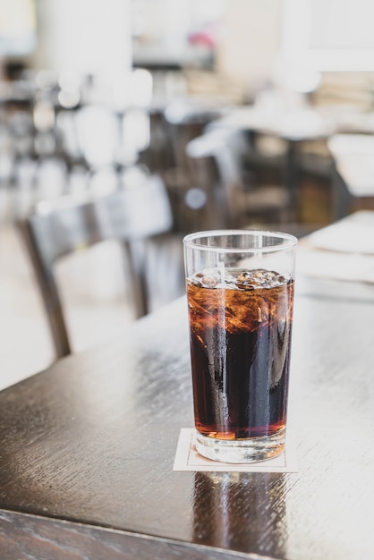 a glass of cola in restaurant