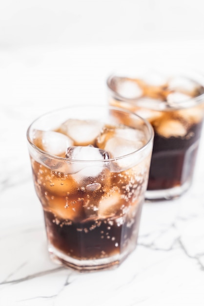 glass of cola with ice