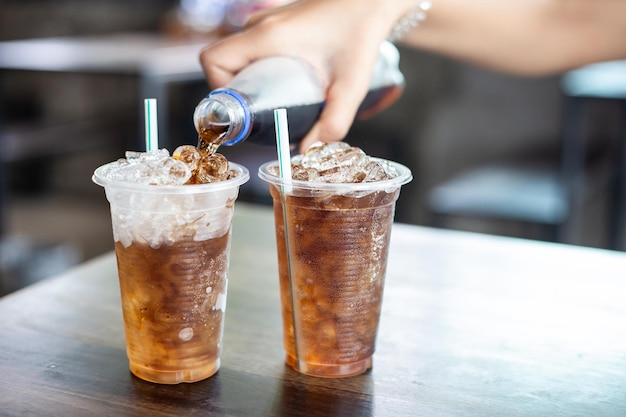 Glass of cola with ice