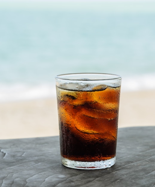 Glass of cola with ice