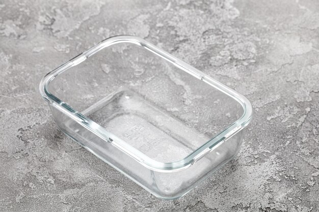 Premium Photo  Disposable plastic transparent lunch box on a gray concrete  table.